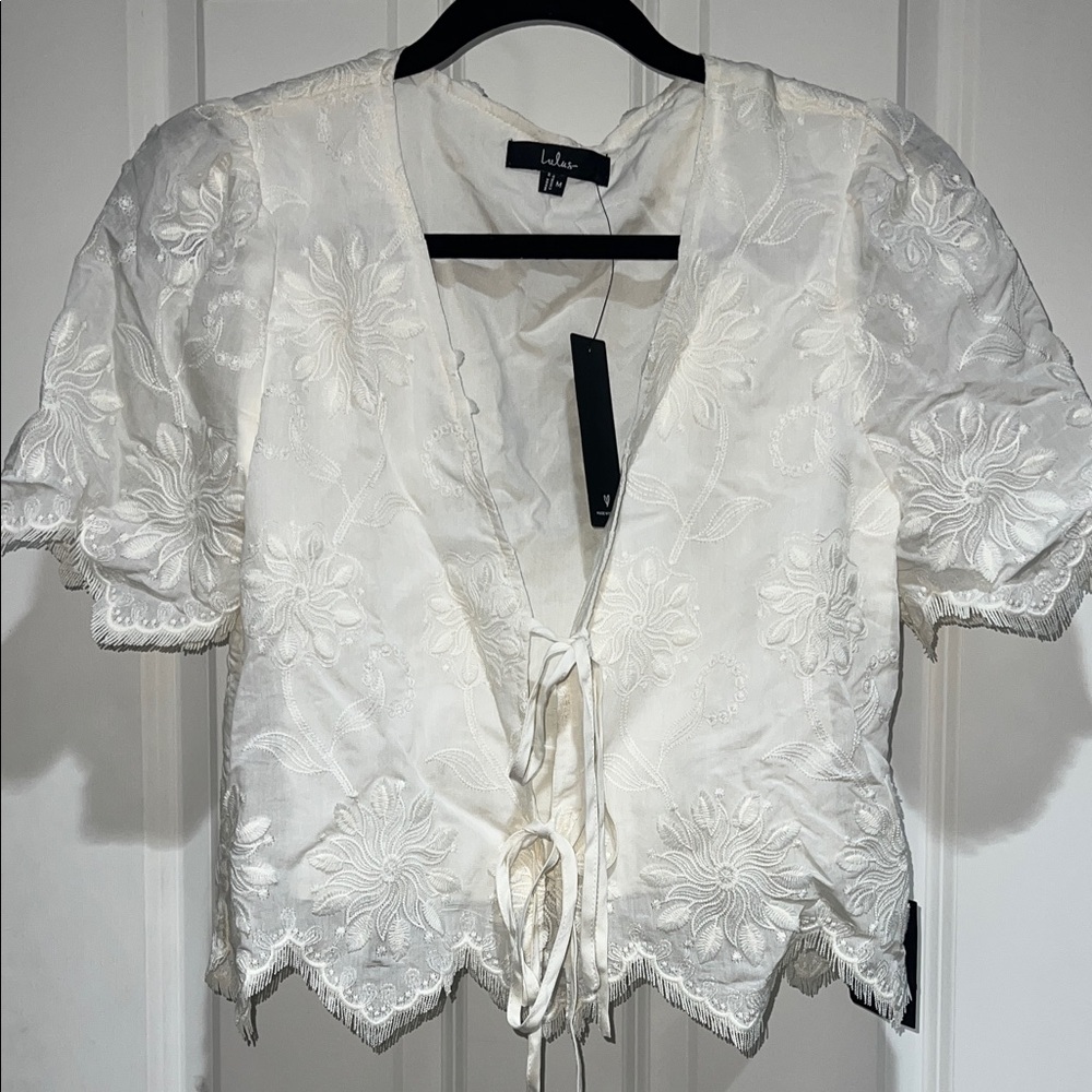 Lulu’s Vintage Aesthetic Ivory Embroidered Tie-Front Fringe Hem Top